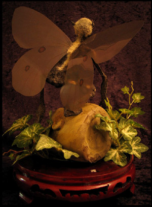 Fairy on abandoned doll image 2